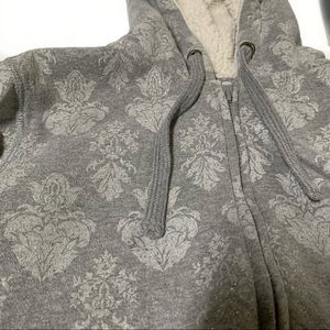 Three hearts zip up hooded sweatshirt